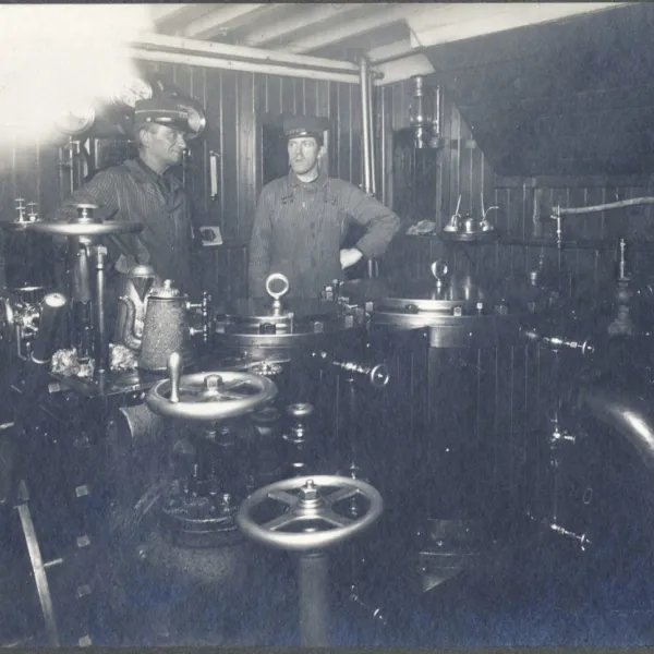 a vintage photo of a group of people posing for the camera