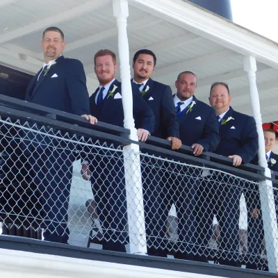 a group of people standing in front of a building