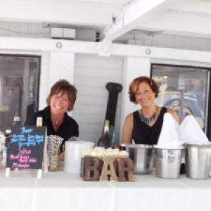 a group of people standing in front of a window
