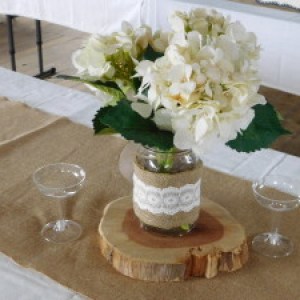 a vase of flowers sitting on a table