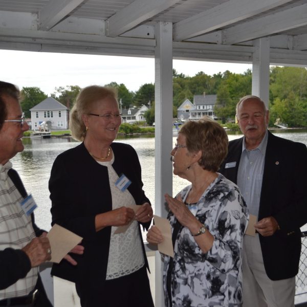 a group of people standing in front of a building